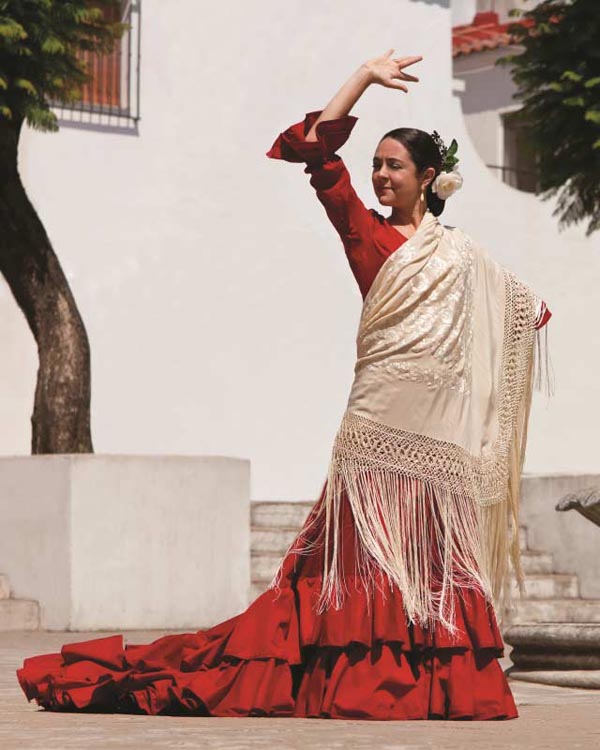 Traditional Woman Spanish Flamenco Dancer In Red Dress